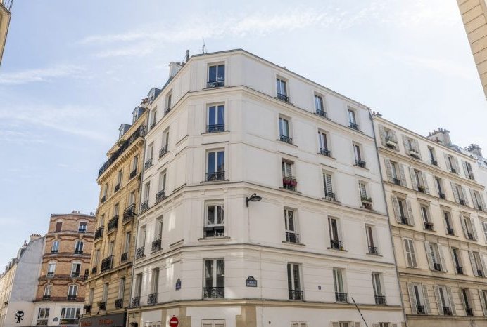 Façade de l'immeuble haussmannien — 3 rue Pestalozzi, Paris 5e